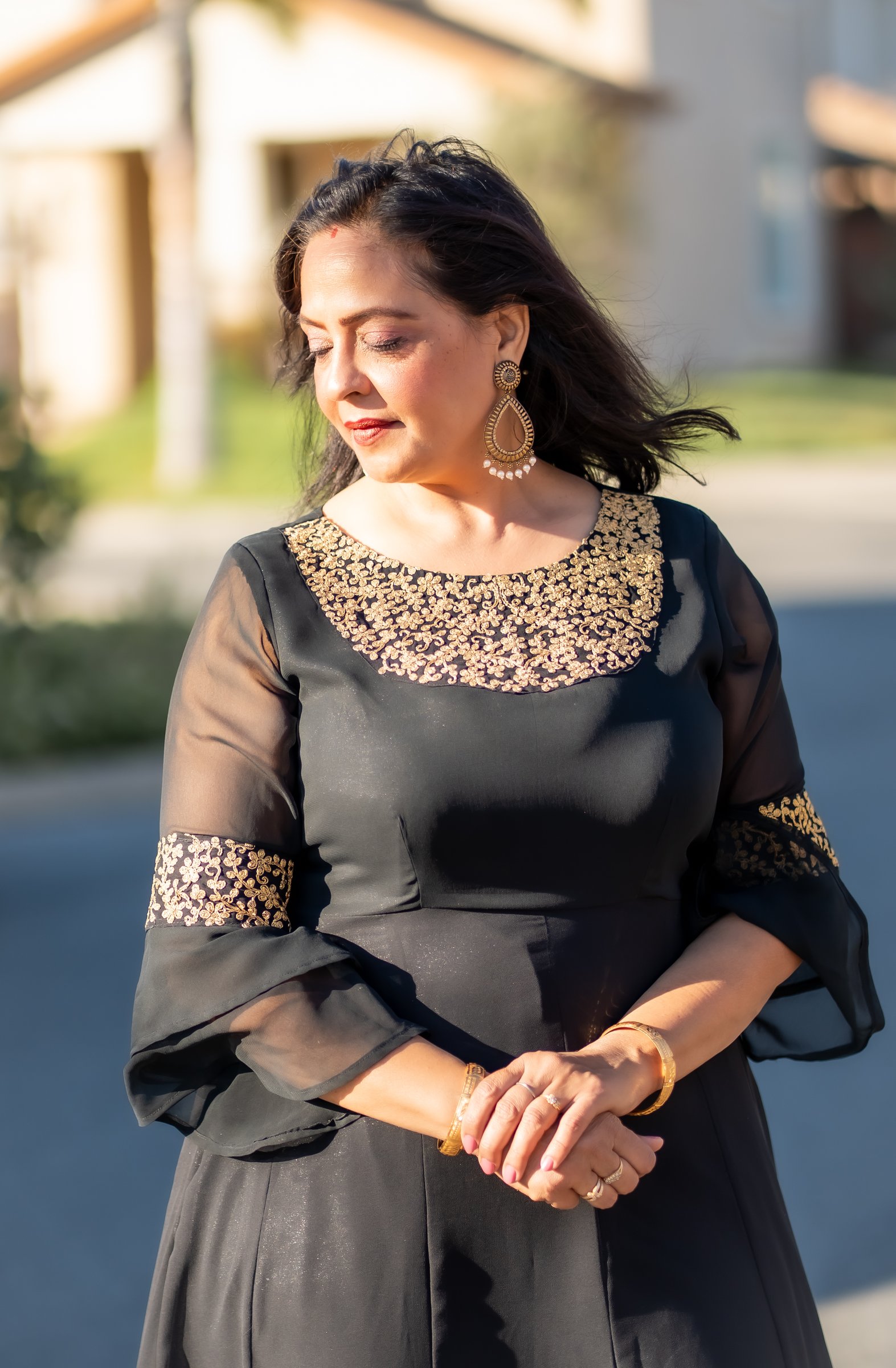 Upma's 50th birthday photos backlit street portrait