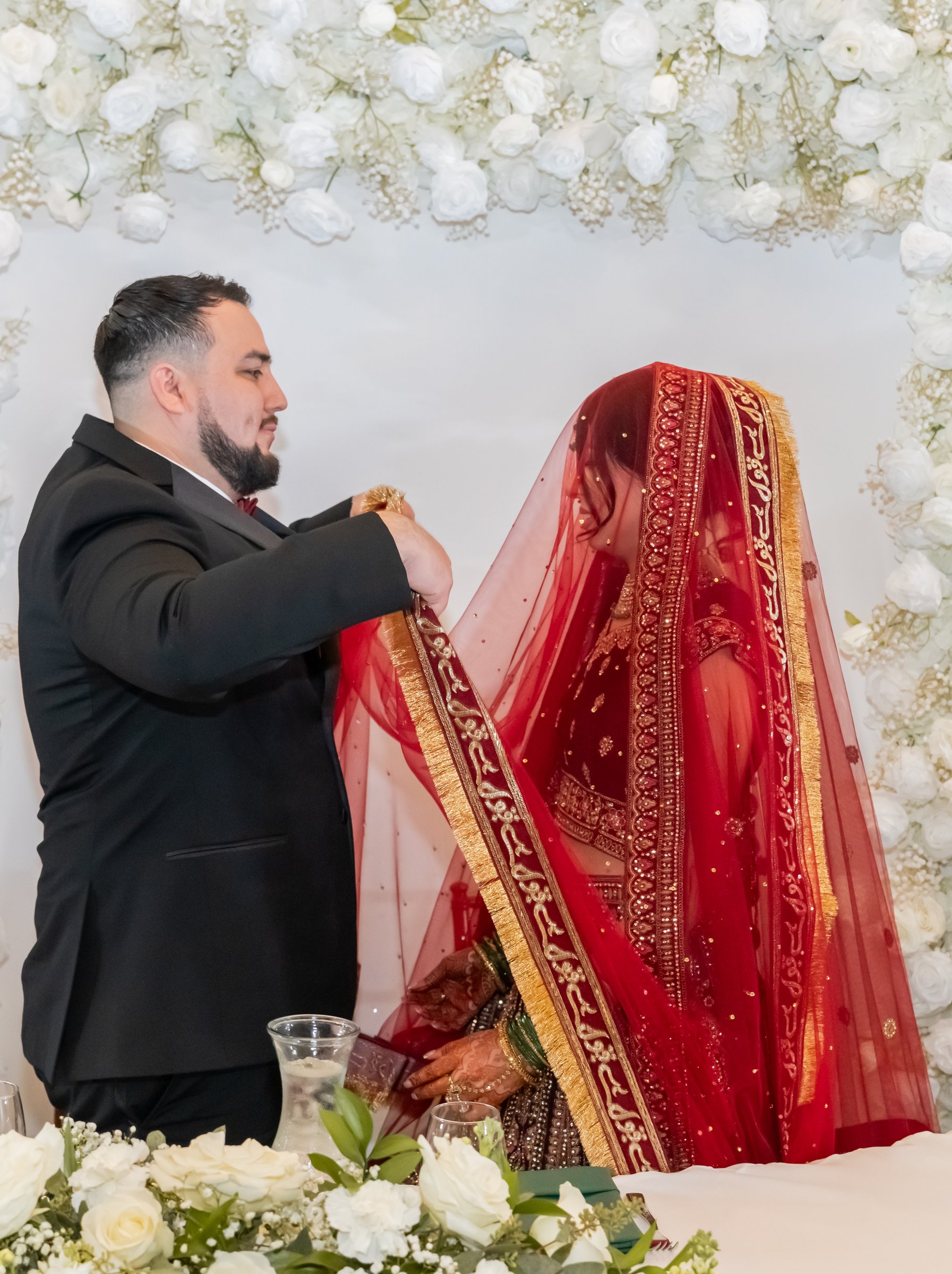 Jaslyn and eduardo's nikkah lifting the red bridal veil